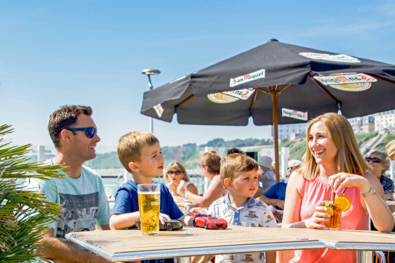family dining on the terrace at bournemouth pier