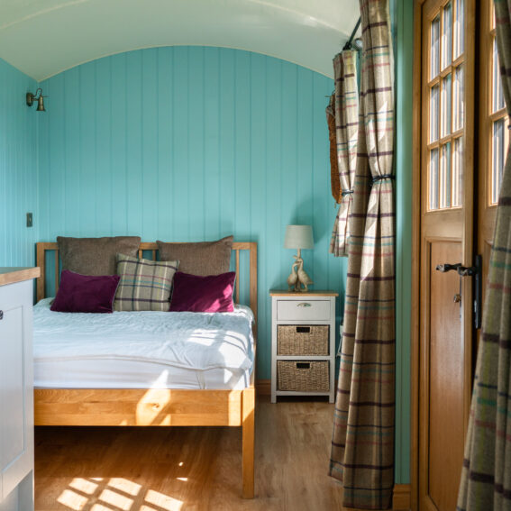double bed in glamping accommodation south lytchett