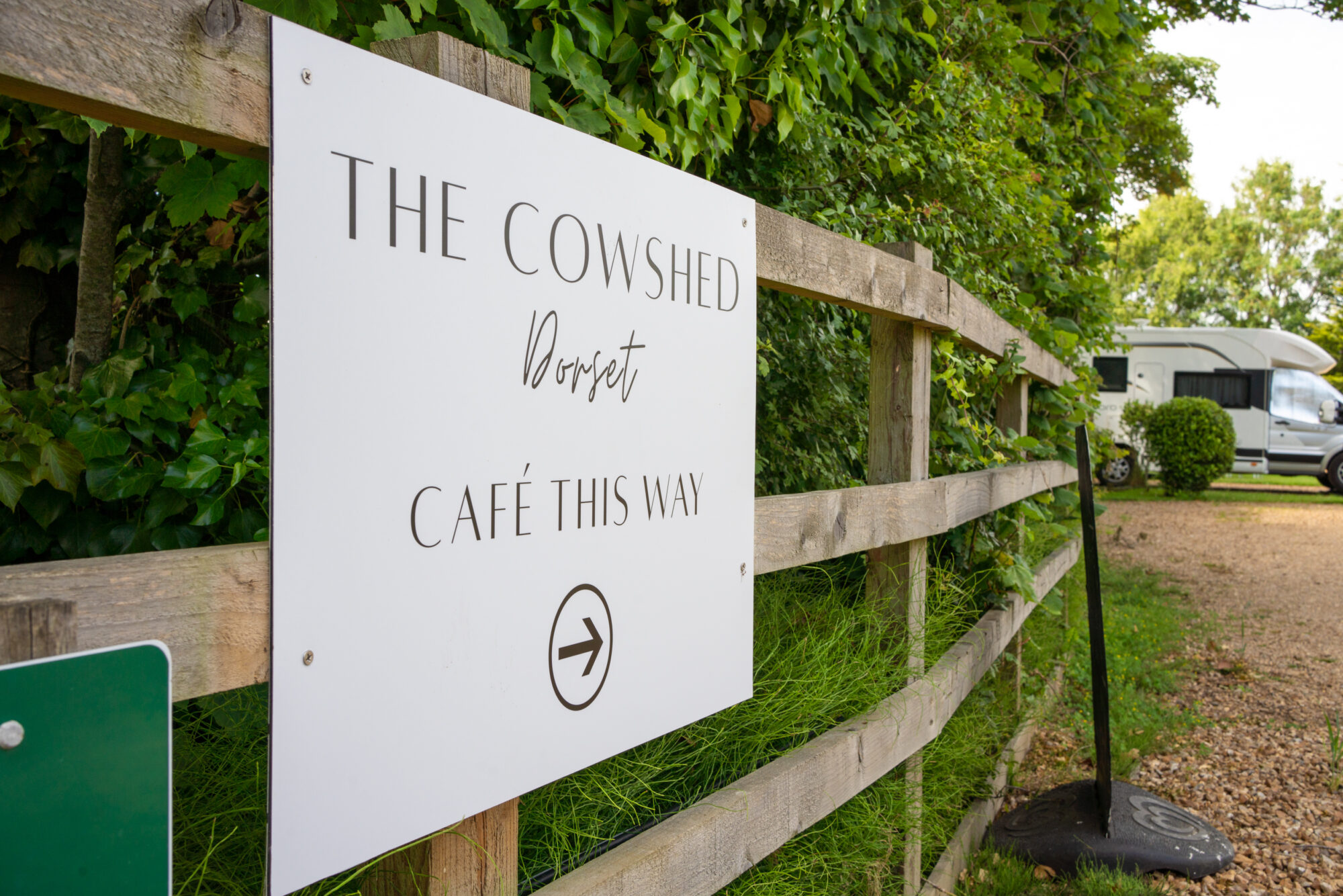 the cowshed dorset cafe thsi way sign