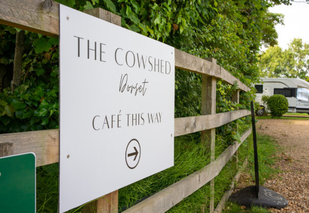 the cowshed dorset cafe thsi way sign
