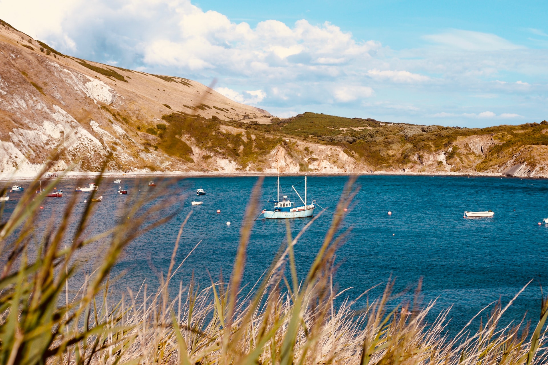 boats anchored in lulworth cove